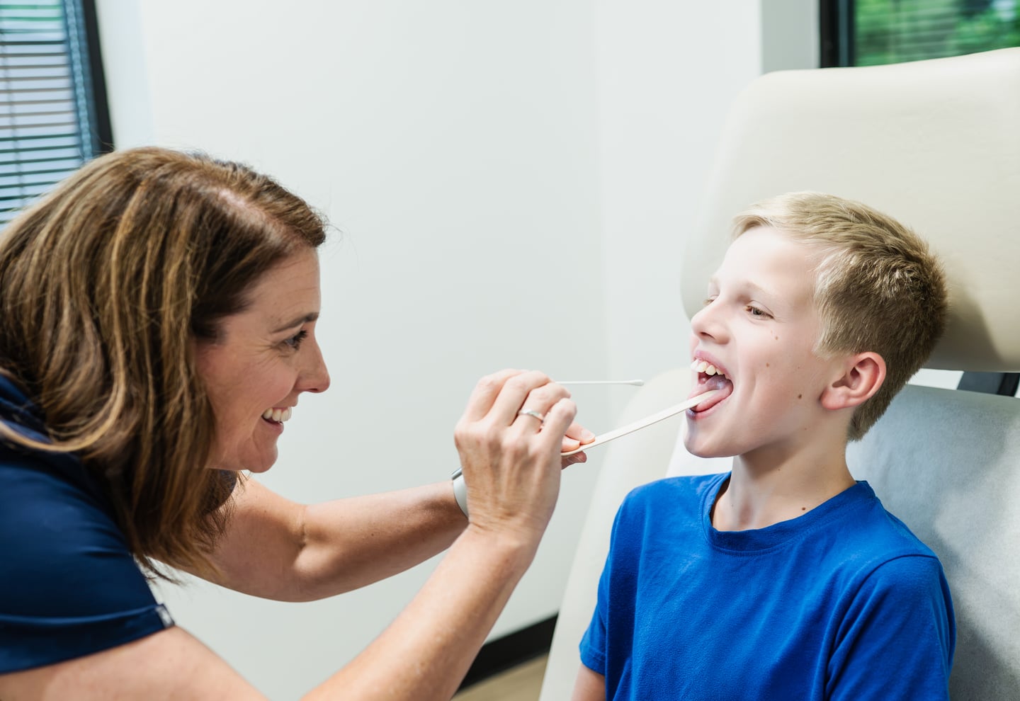 Carolina Medical Group clinician examining a young patient